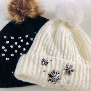 Set of ladies stocking hats with faux fir Pom poms
